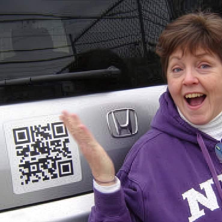 Marie-Graham-with-QR-code-on-her-Honda-Element